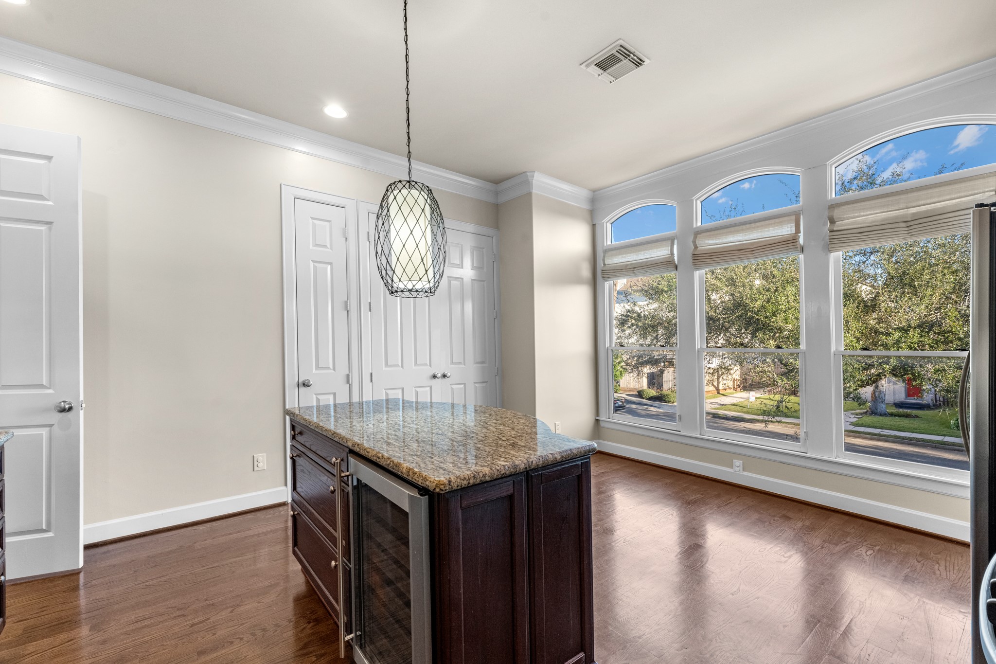 5106 Crawford Street Houston, TX 77004 - Photo 14 of 37 a room with wooden floor and window