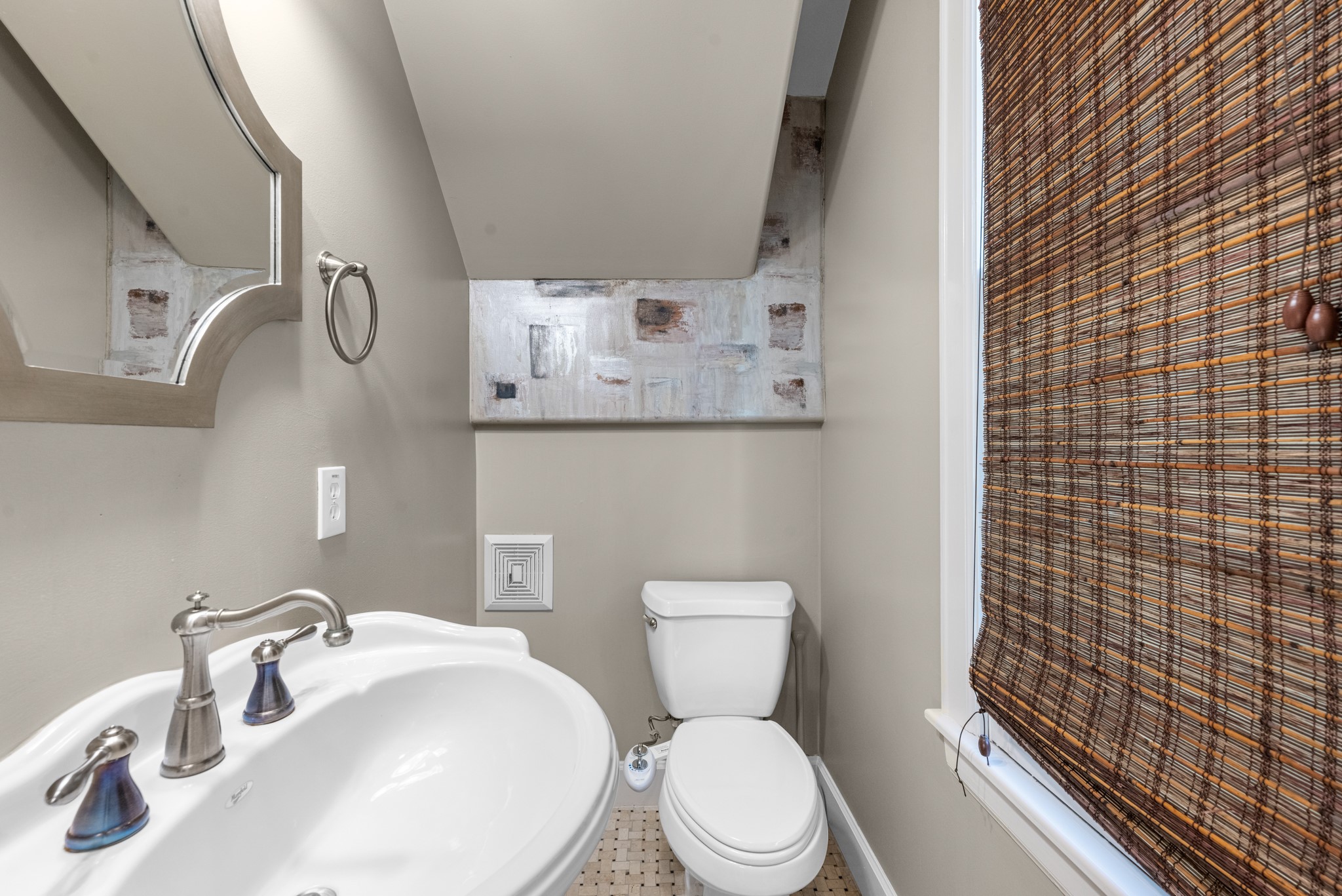 5106 Crawford Street Houston, TX 77004 - Photo 21 of 37 a white toilet sitting next to a bathroom sink