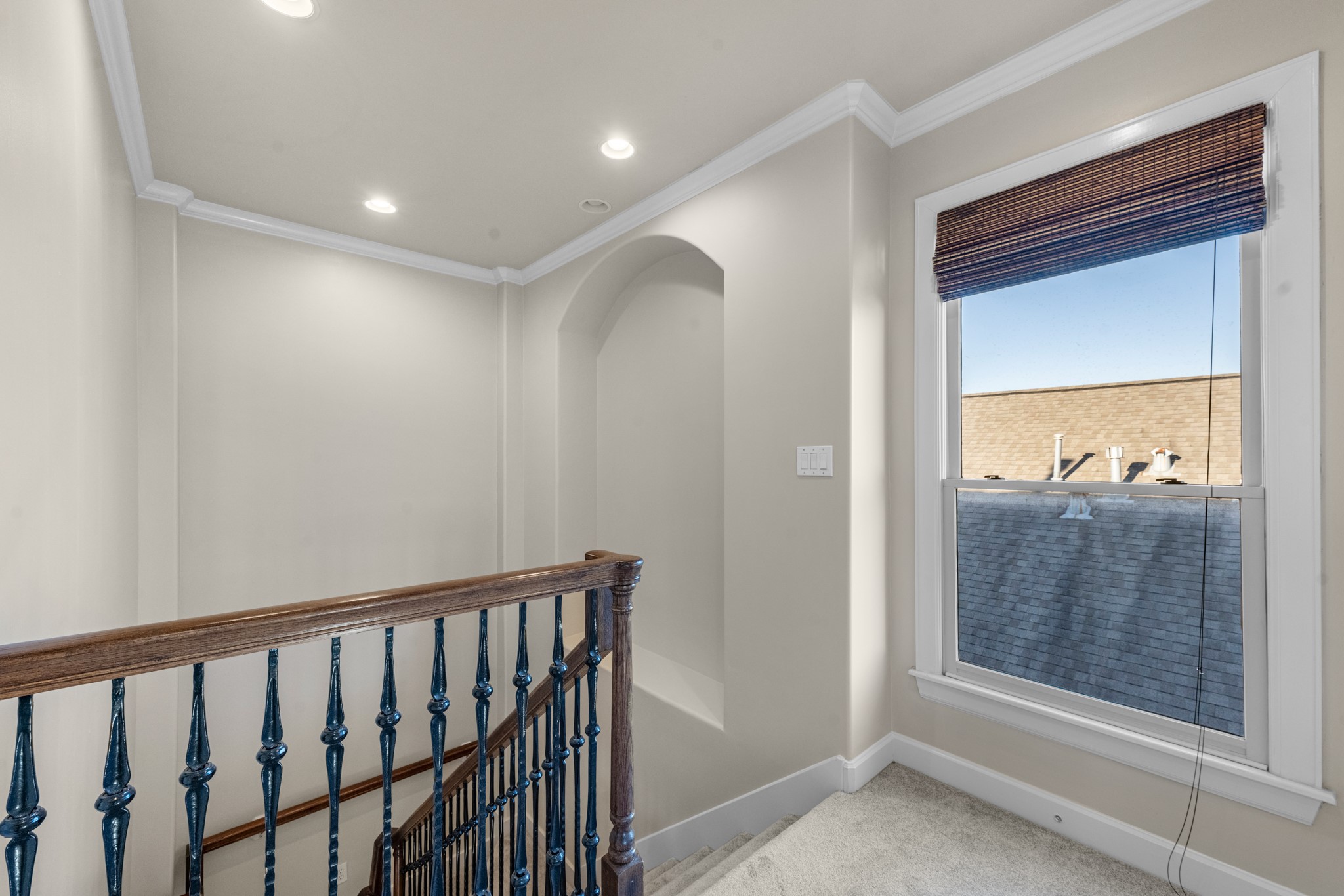 5106 Crawford Street Houston, TX 77004 - Photo 22 of 37 a view of a hallway view with wooden floor and dining room view