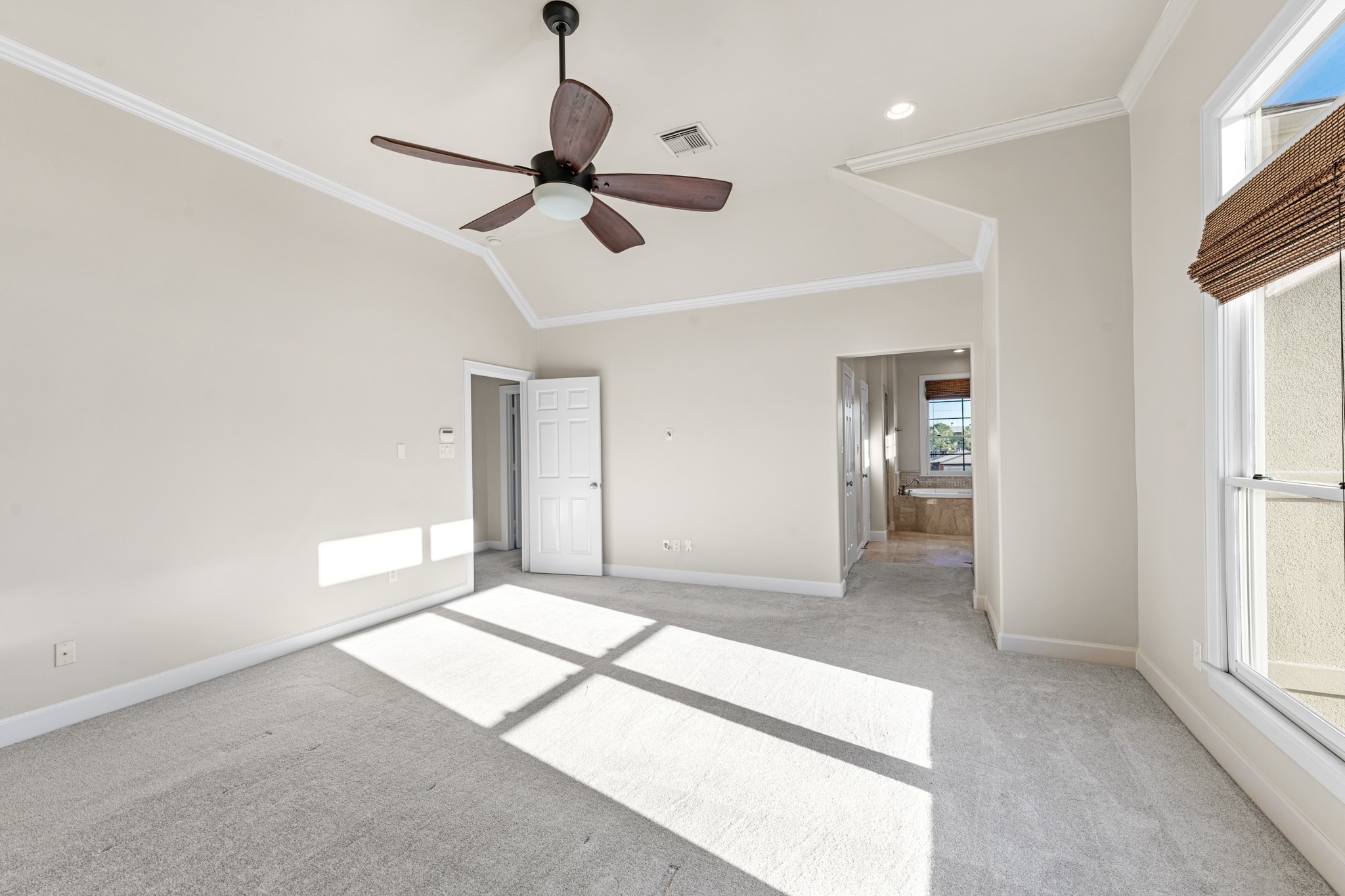 5106 Crawford Street Houston, TX 77004 - Photo 24 of 37 a view of empty room with wooden floor and fan