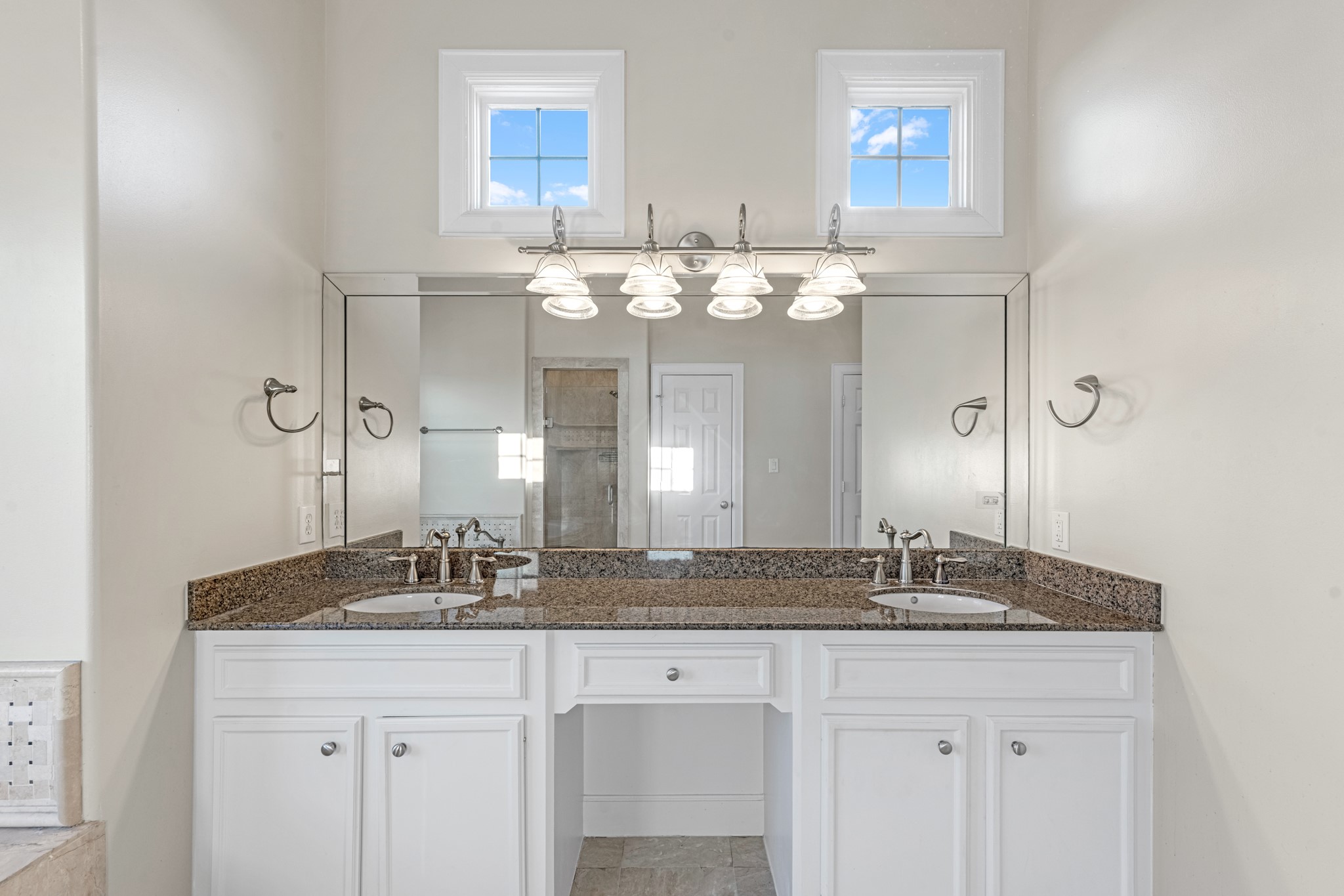 5106 Crawford Street Houston, TX 77004 - Photo 29 of 37 a bathroom with a sink and a mirror