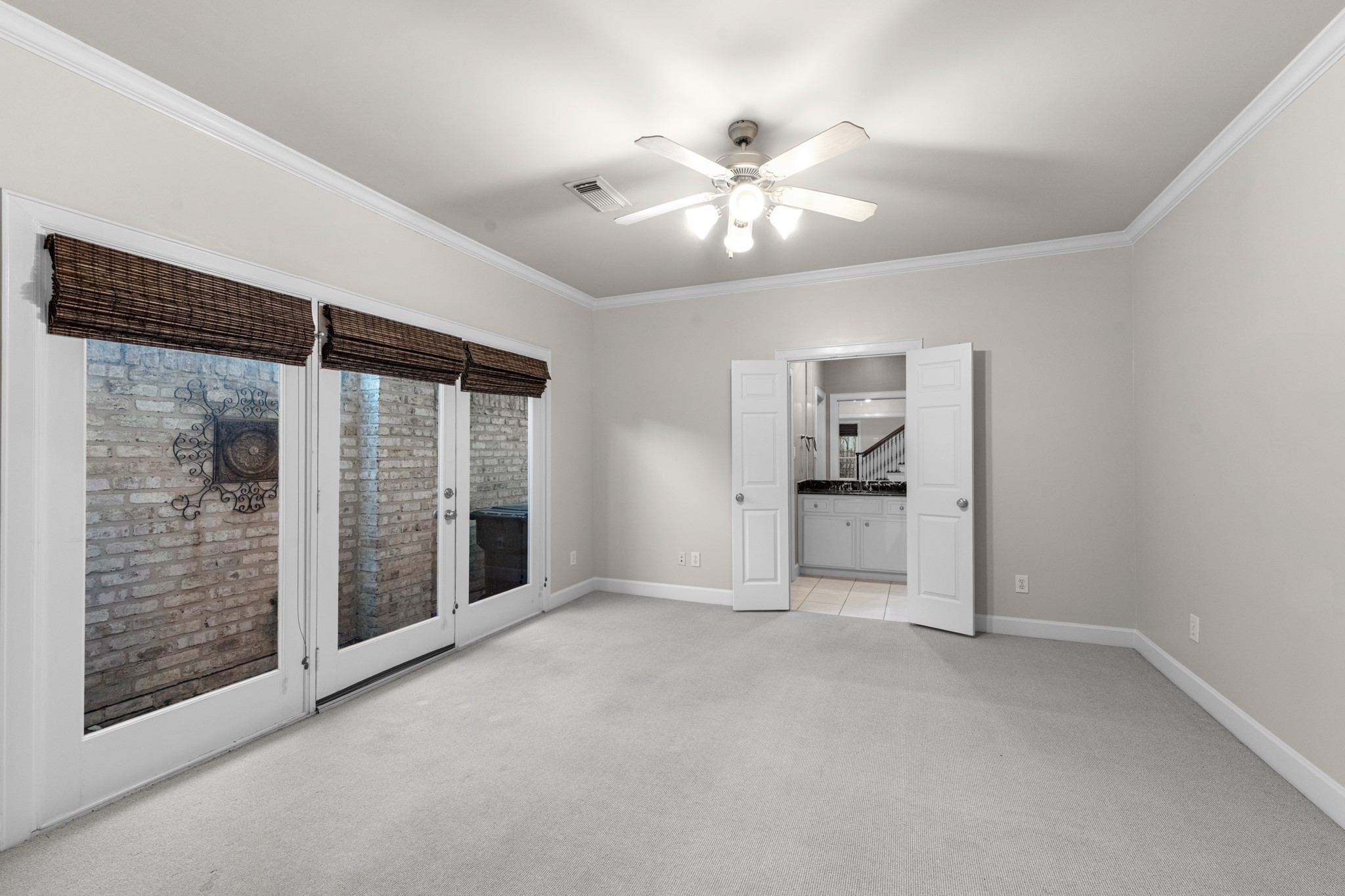 5106 Crawford Street Houston, TX 77004 - Photo 7 of 37 a view of an empty room with a window