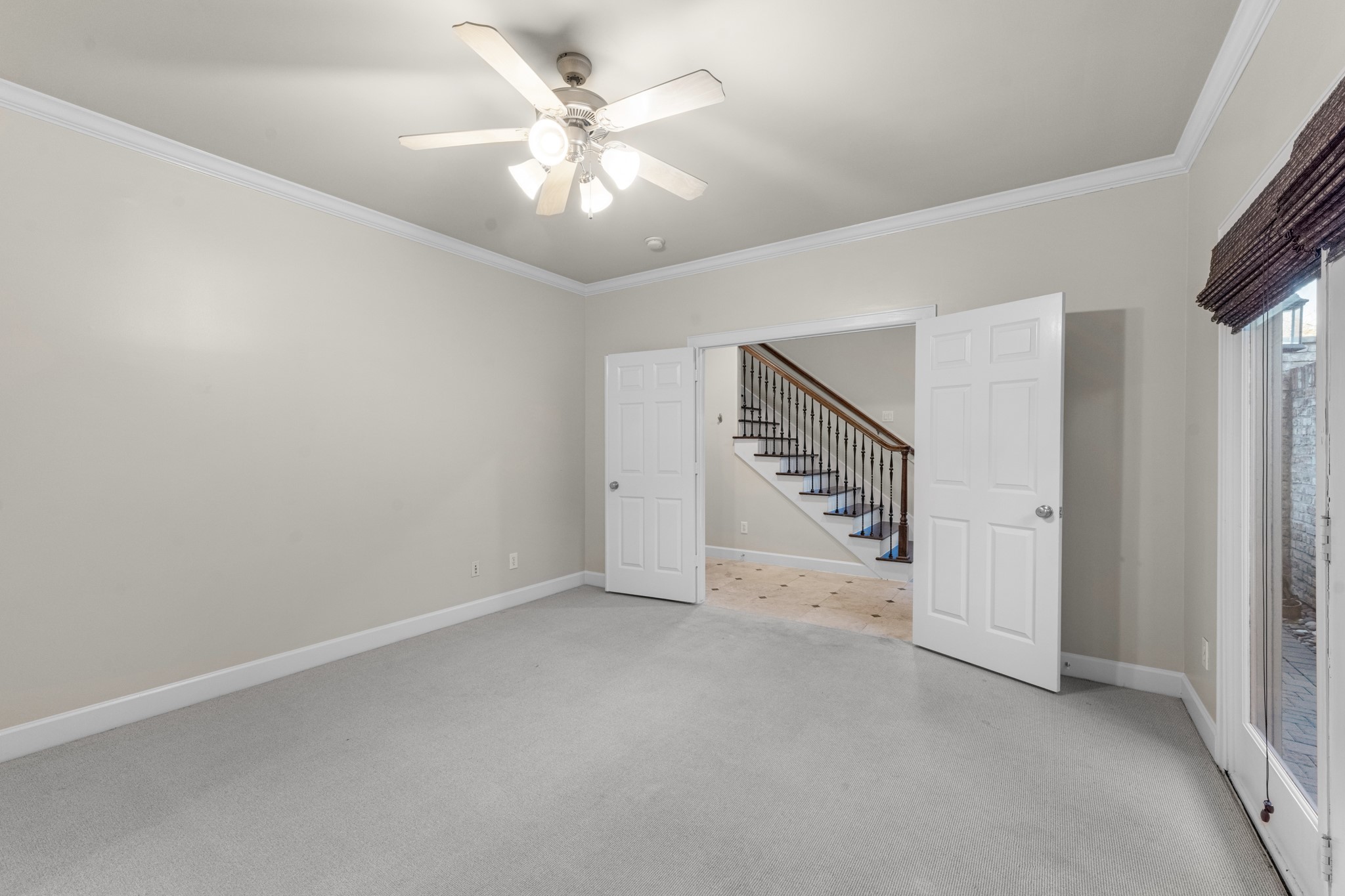 5106 Crawford Street Houston, TX 77004 - Photo 8 of 37 a view of an empty room with a window