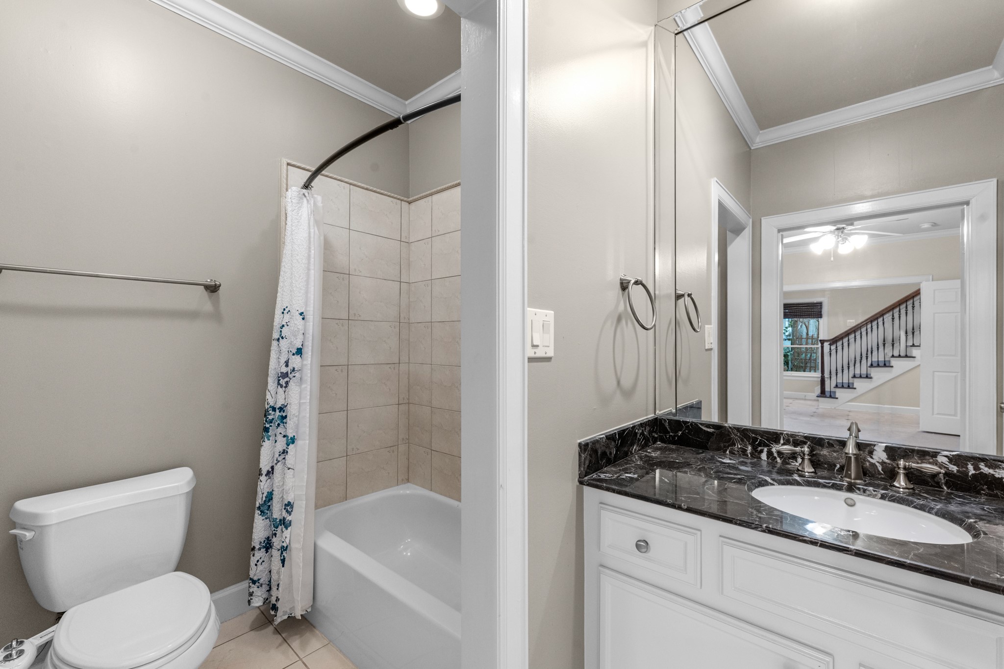 5106 Crawford Street Houston, TX 77004 - Photo 9 of 37 a bathroom with a granite countertop sink toilet and shower