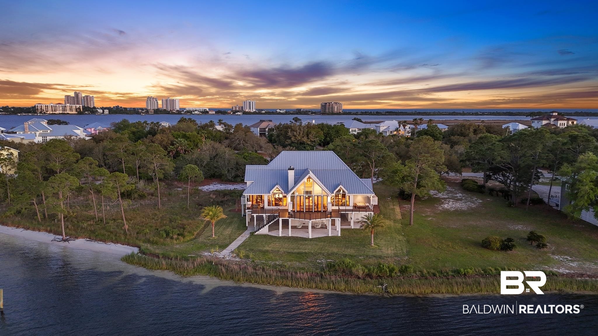 33349 River Road Orange Beach, AL 36561 - Photo 48 of 61 Waterfront residence featuring a light-colored exterior and a metal roof