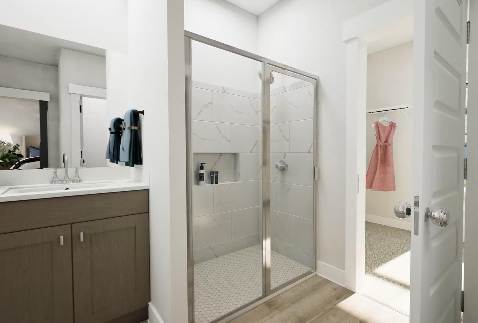 365 Bluebeech Street Freeport, FL 32439 - Photo 25 of 39 a bathroom with a shower sink and mirror