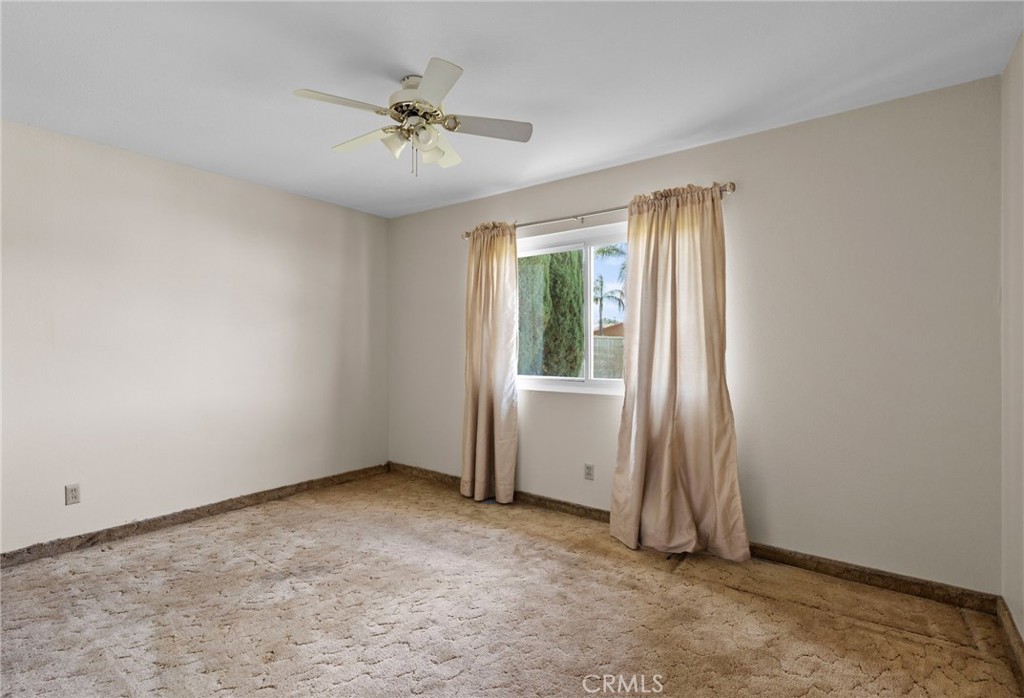 26652 7th Street Highland, CA 92346 - Photo 16 of 27 an empty room with closet and windows