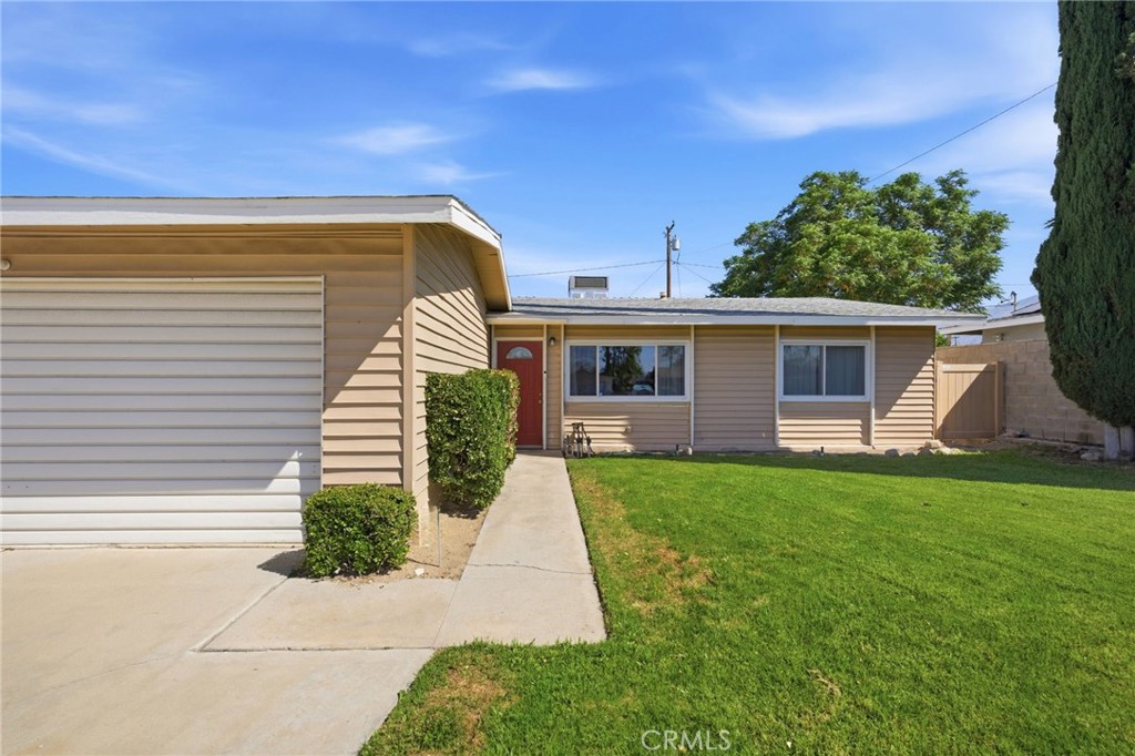 26652 7th Street Highland, CA 92346 - Photo 2 of 27 a view of a house with a backyard