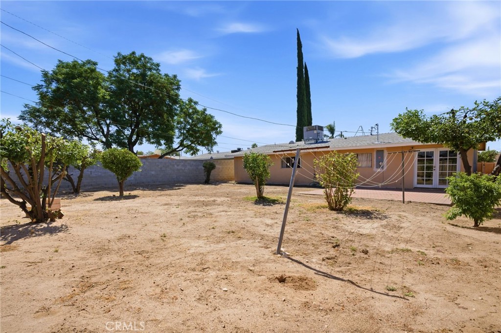 26652 7th Street Highland, CA 92346 - Photo 23 of 27 a view of a terrace with a bench