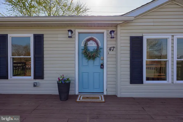 a front view of a house with entryway