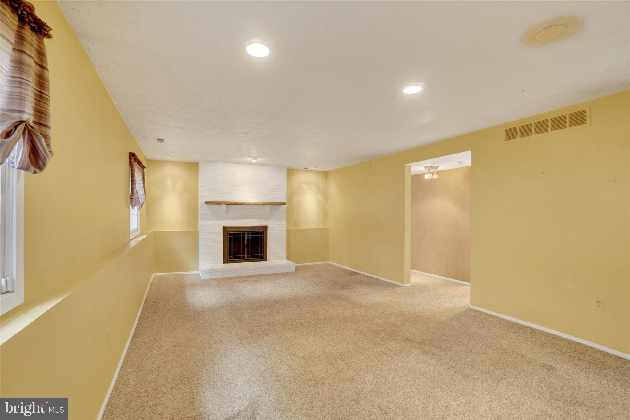 15801 Ensor Mill Road Sparks Glencoe, MD 21152 - Photo 13 of 31 The family room has a cozy wood-burning fireplace.