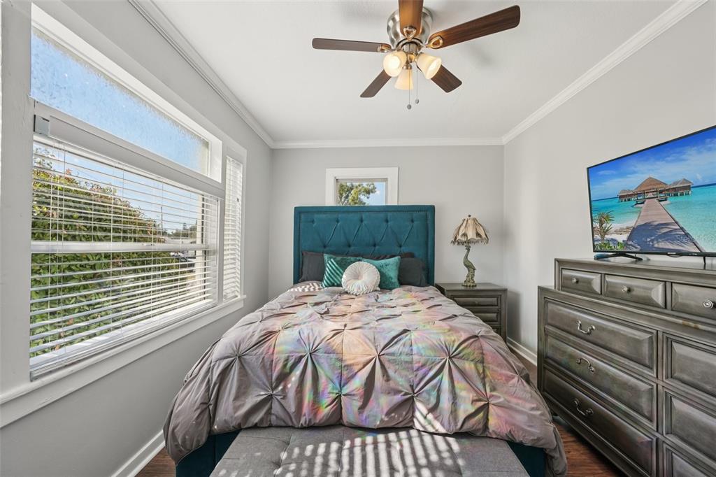 4809 33rd Avenue North St. Petersburg, FL 33713 - Photo 21 of 62 a bedroom with a bed and a window