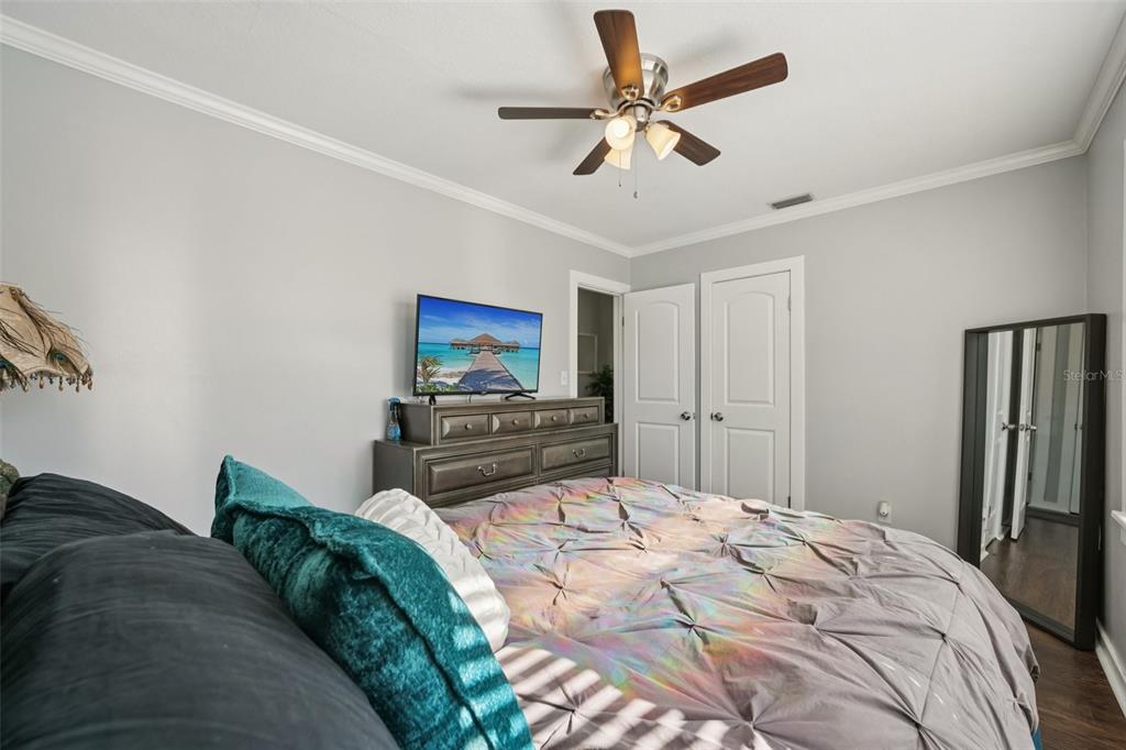 4809 33rd Avenue North St. Petersburg, FL 33713 - Photo 22 of 62 a bedroom with a bed and a flat screen tv