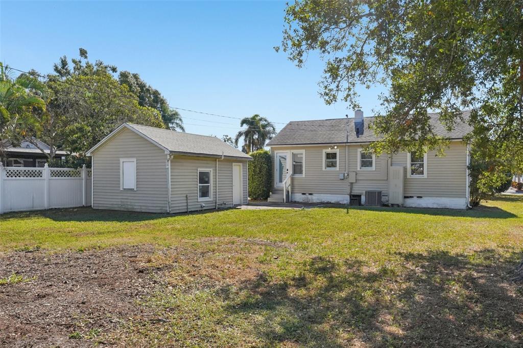 4809 33rd Avenue North St. Petersburg, FL 33713 - Photo 37 of 62 a view of a house with pool and a yard