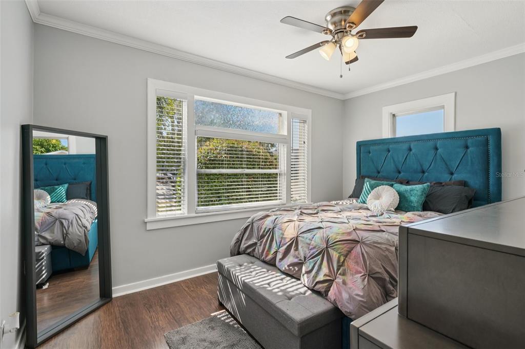 4809 33rd Avenue North St. Petersburg, FL 33713 - Photo 5 of 62 a bed sitting in a bedroom next to a window