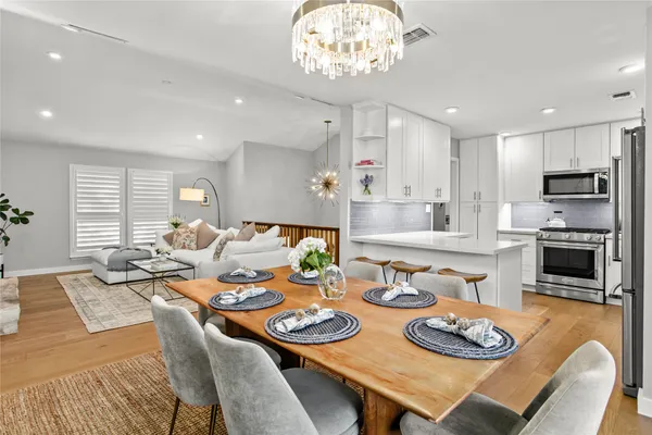 a view of a dining room with furniture