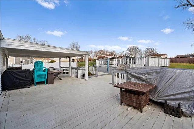a view of a balcony with chairs