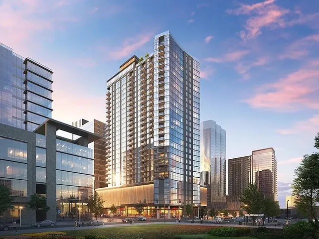 a kitchen with sink and large window