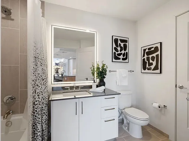 a view of a house with backyard sitting area and garden