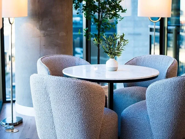 a view of a building with a backyard