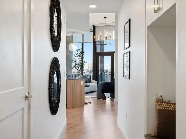 a kitchen with counter top space a sink and cabinets