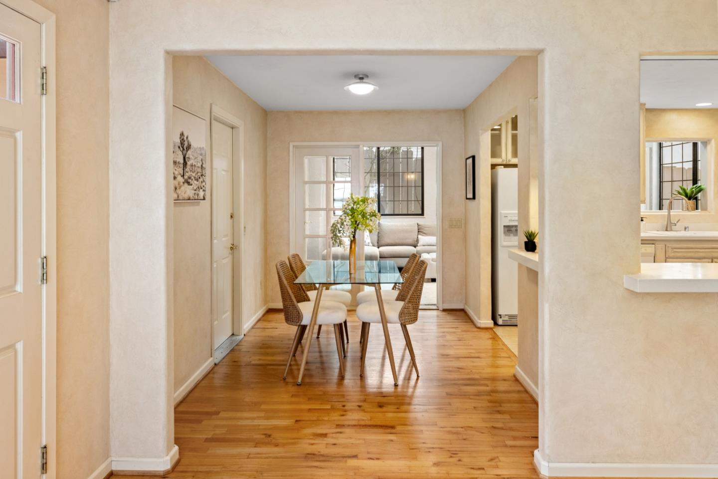 777 Parcel Street Monterey, CA 93940 - Photo 6 of 21 a dining room with furniture a chandelier and wooden floor