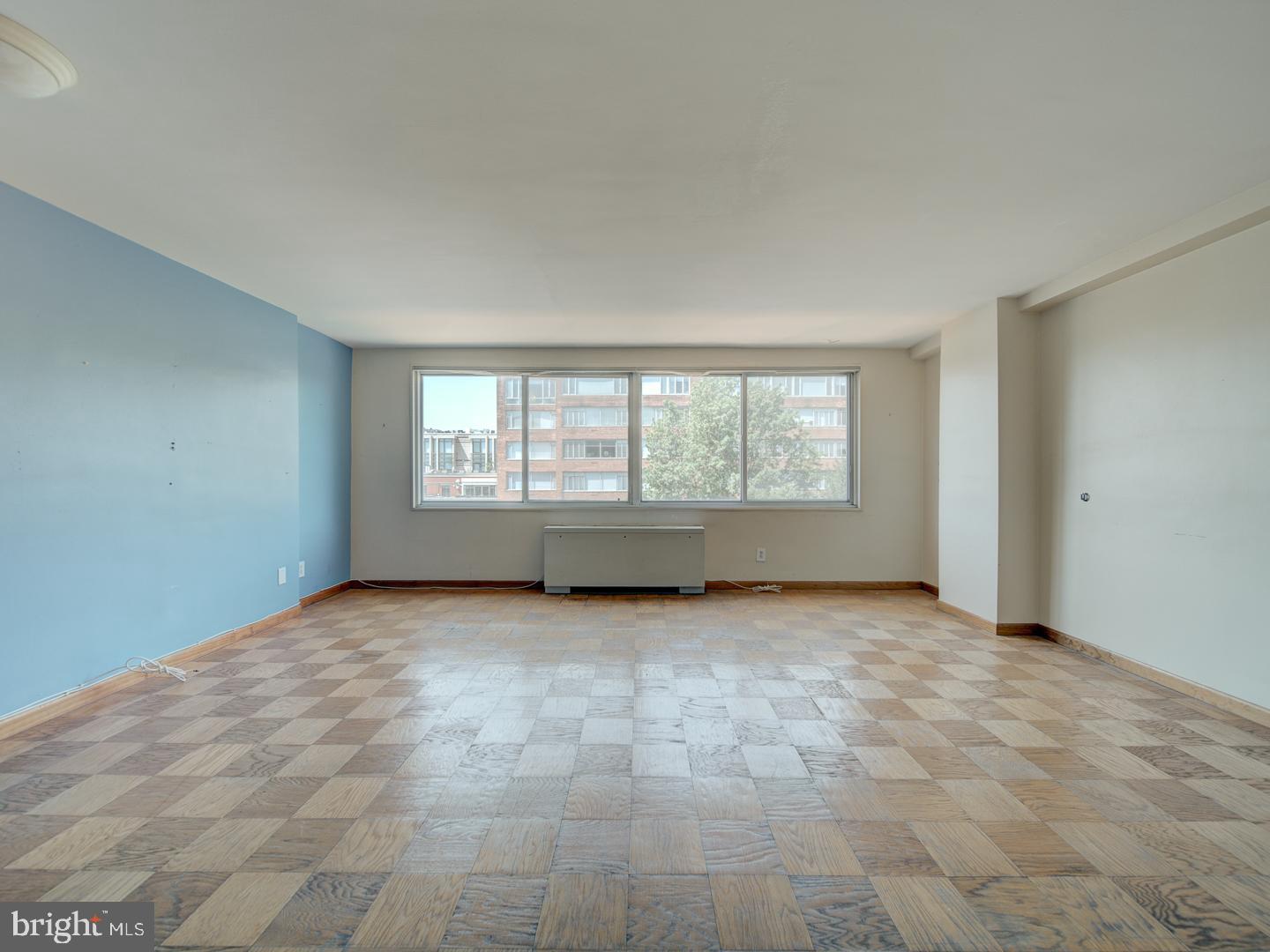 2829 Connecticut Avenue Northwest, Unit 606 Washington, DC 20008 - Photo 13 of 28 a view of an empty room with a window