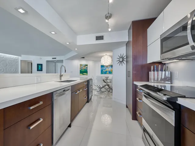 a bathroom with a shower a toilet and sink