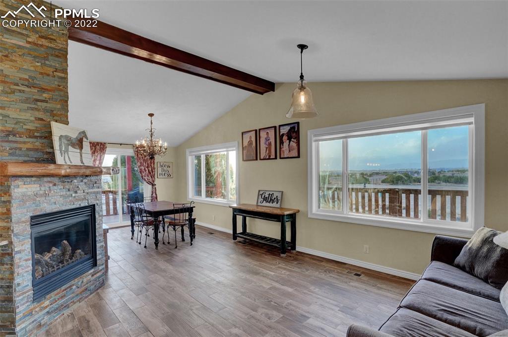 1451 R Street Penrose, CO 81240 - Photo 11 of 50 a living room with furniture and a fireplace