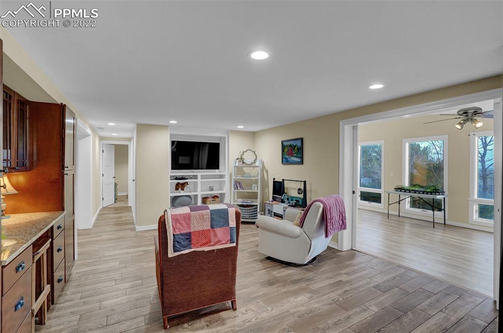 1451 R Street Penrose, CO 81240 - Photo 14 of 50 a living room with furniture and a flat screen tv