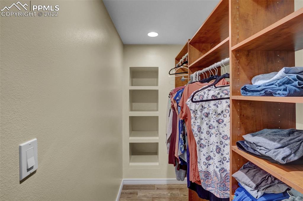 1451 R Street Penrose, CO 81240 - Photo 21 of 50 a view of walk in closet with clothes and shoes