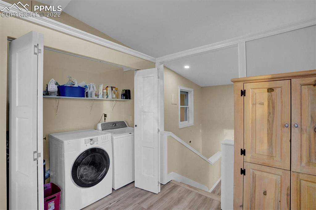 1451 R Street Penrose, CO 81240 - Photo 24 of 50 a view of a hallway with washer and dryer