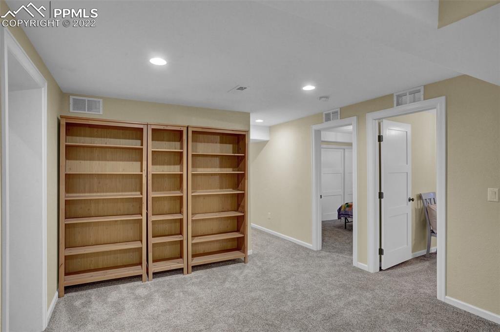 1451 R Street Penrose, CO 81240 - Photo 28 of 50 a view of an empty room with a cabinet and a window
