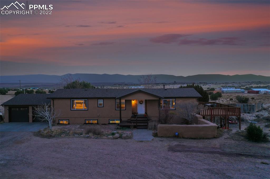 1451 R Street Penrose, CO 81240 - Photo 3 of 50 a view of a house with a patio