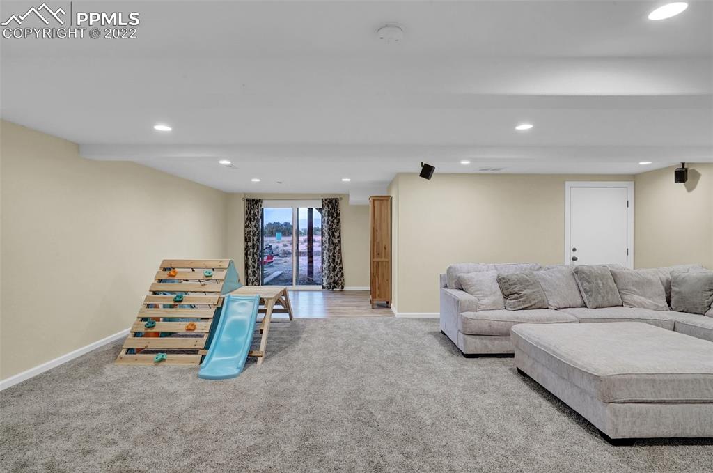 1451 R Street Penrose, CO 81240 - Photo 35 of 50 a living room with furniture and white walls