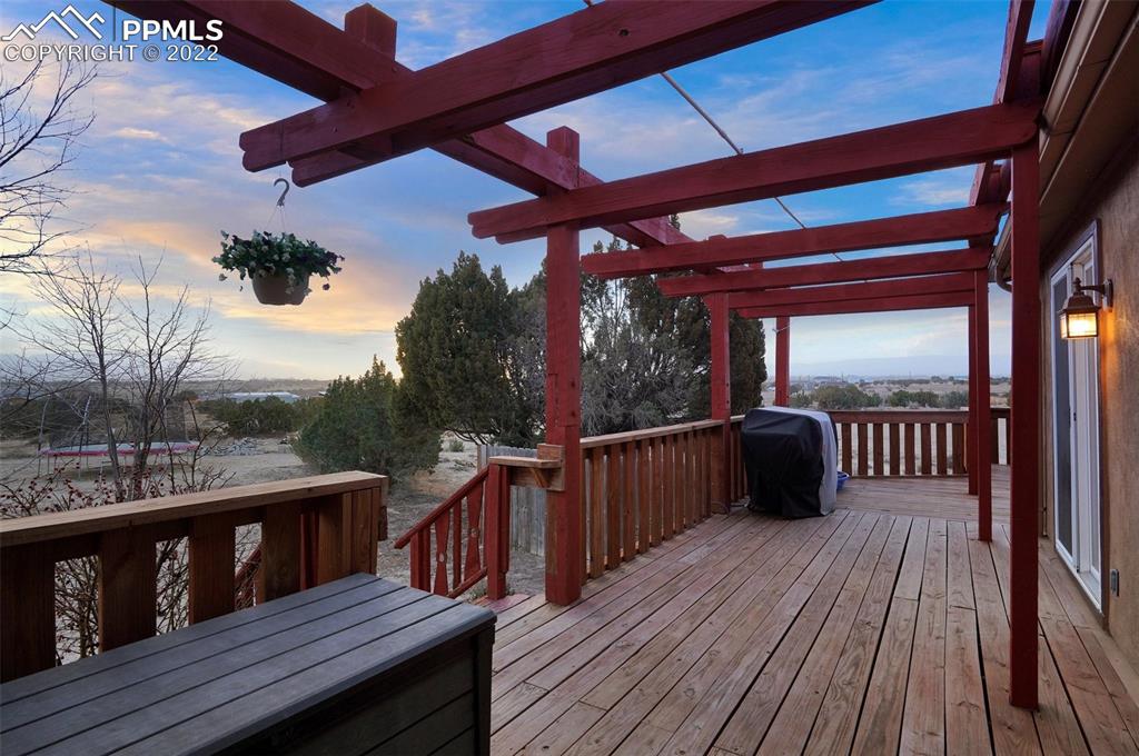 1451 R Street Penrose, CO 81240 - Photo 38 of 50 a view of a balcony with wooden floor