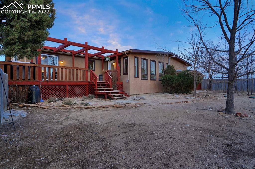 1451 R Street Penrose, CO 81240 - Photo 40 of 50 a front view of a house with a yard