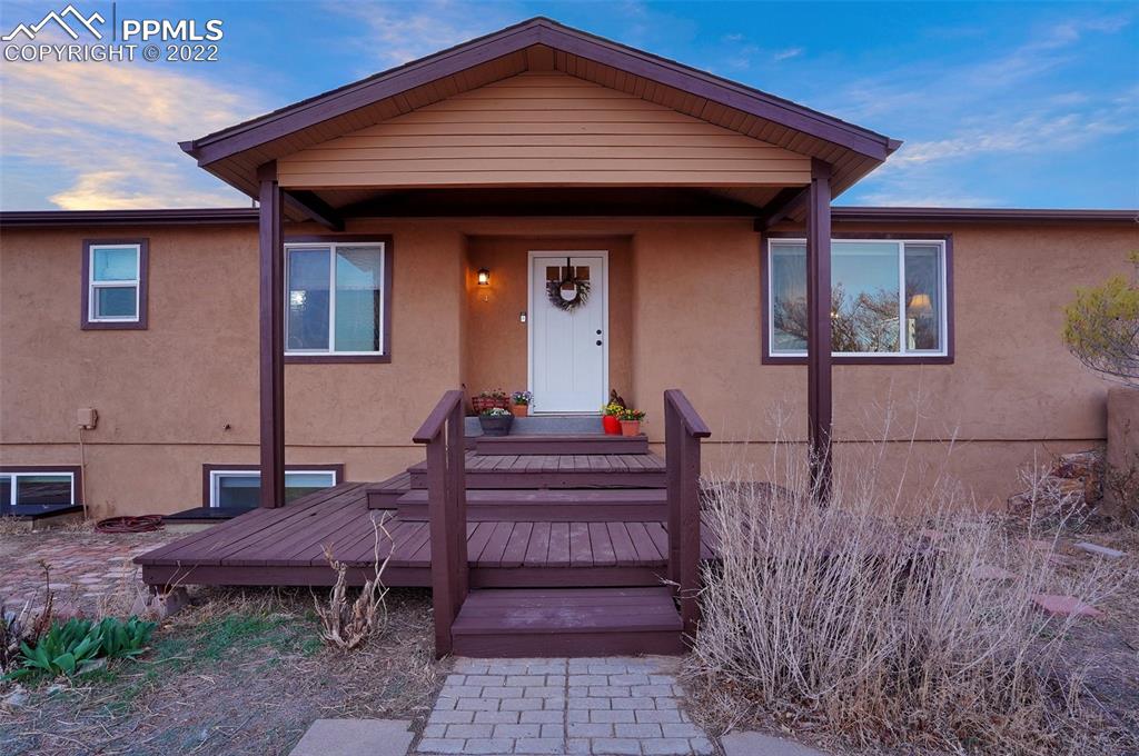 1451 R Street Penrose, CO 81240 - Photo 50 of 50 a front view of a house with a yard