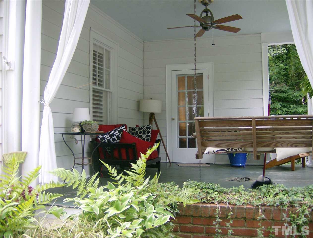 919 West Johnson Street Raleigh, NC 27605 - Photo 18 of 20 a backyard of a house with outdoor seating