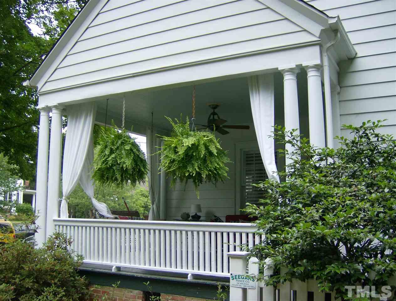 919 West Johnson Street Raleigh, NC 27605 - Photo 19 of 20 a view of a house with a small yard and plants