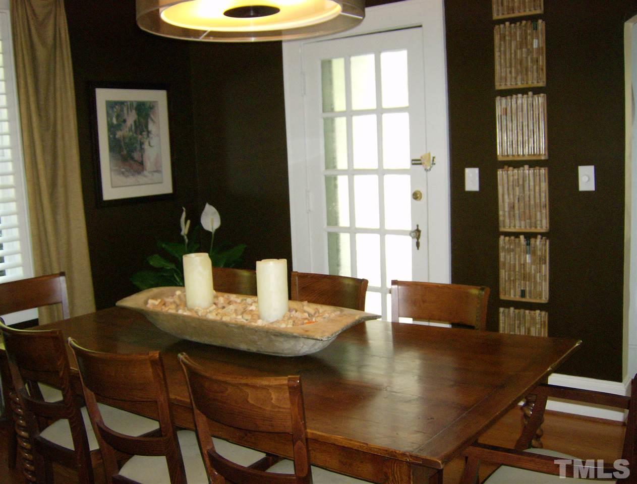 919 West Johnson Street Raleigh, NC 27605 - Photo 5 of 20 a view of a dining room with furniture and window