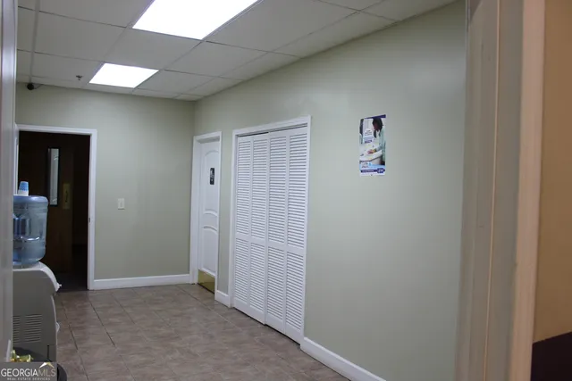 a view of a workspace with furniture