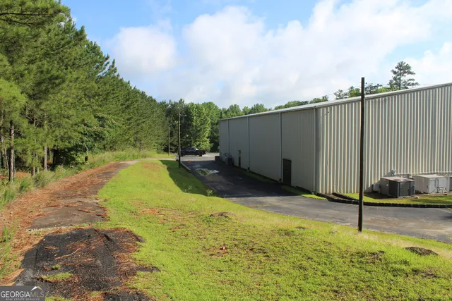 a view of swimming pool with a backyard