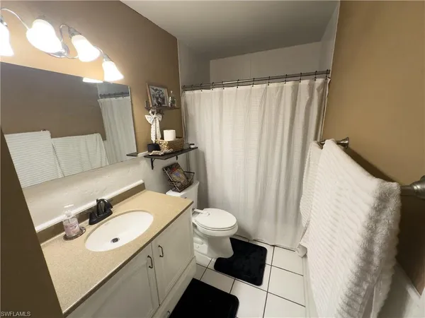 $399,000 | 651 Pine Cone Lane, Naples, FL 34104