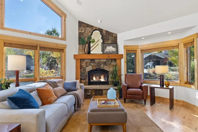 a living room with a couch and a window