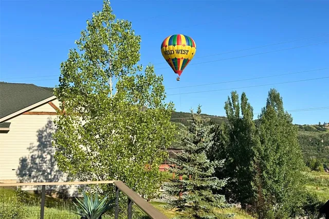 a view of a chair and table in the deck