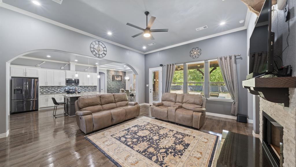 401 May Road Seagoville, TX 75159 - Photo 12 of 31 a living room with furniture and a fireplace