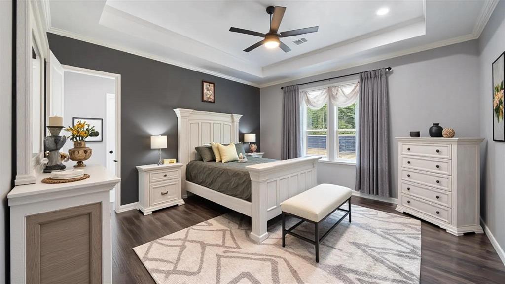 401 May Road Seagoville, TX 75159 - Photo 17 of 31 a bedroom with a bed and a dresser