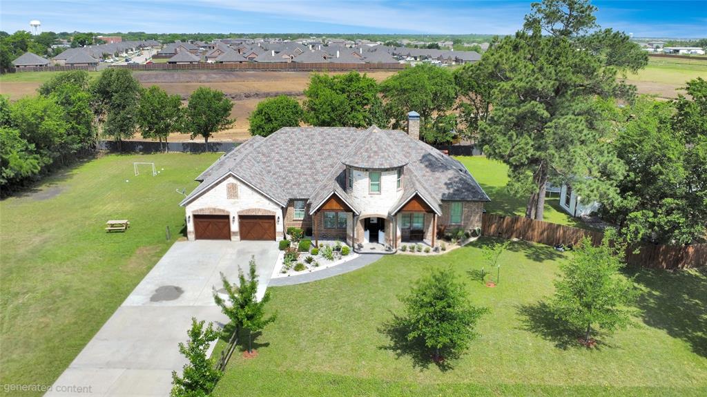 401 May Road Seagoville, TX 75159 - Photo 29 of 31 an aerial view of a house with garden space and lake view