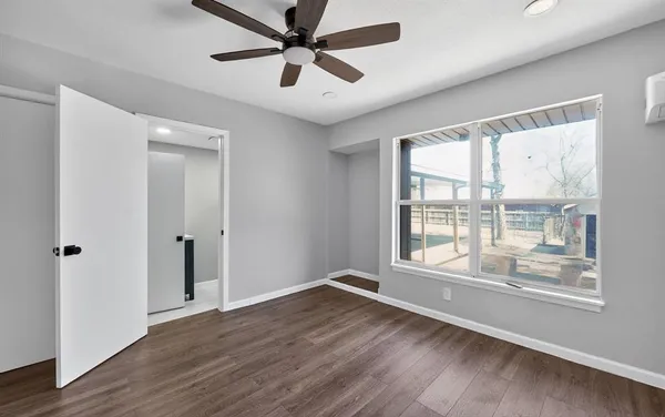 a bathroom with a sink a mirror and a toilet